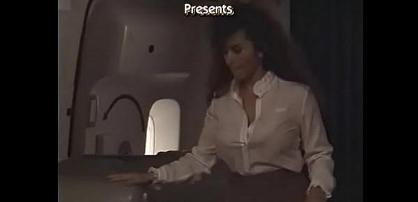  Experienced flight attendants with curvaceous figure Keisha helps pretty young passenger who flies the first time on the airplane and feels herself anxiously